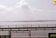 जलप्रलय की आहट: प्रयागराज के संगम तट पर माँ गंगा और यमुना ने धारण किया विकराल रौद्र रूप, निचले इलाकों में अलर्ट